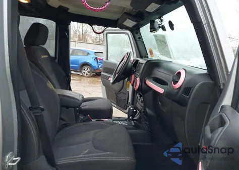 2013 Jeep Wrangler Unlimited Sahara z USA, uszkodzony, nr VIN 1C4BJWEG3DL627424